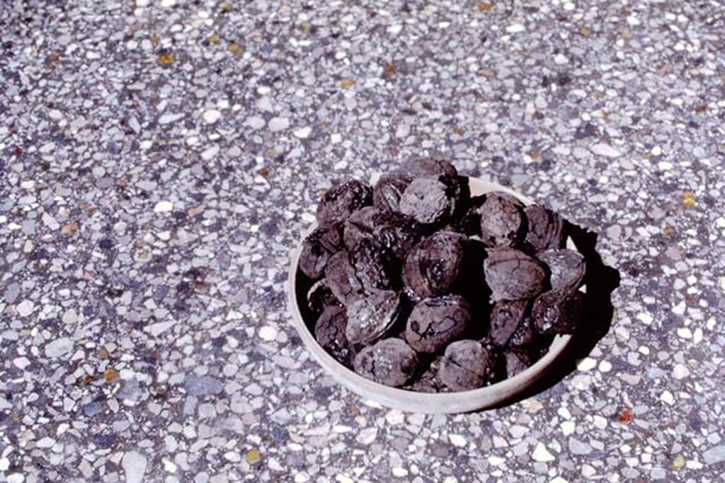 Walnuts. 1968 photo taken in the Naples Museum, not necessarily the same walnuts as found in the Bar of Priapus. Photo by Stanley A. Jashemski.
Source: The Wilhelmina and Stanley A. Jashemski archive in the University of Maryland Library, Special Collections (See collection page) and made available under the Creative Commons Attribution-Non Commercial License v.4. See Licence and use details. J68f0821